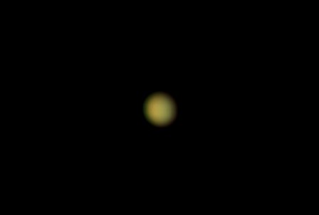 Venus as a bright featureless disc