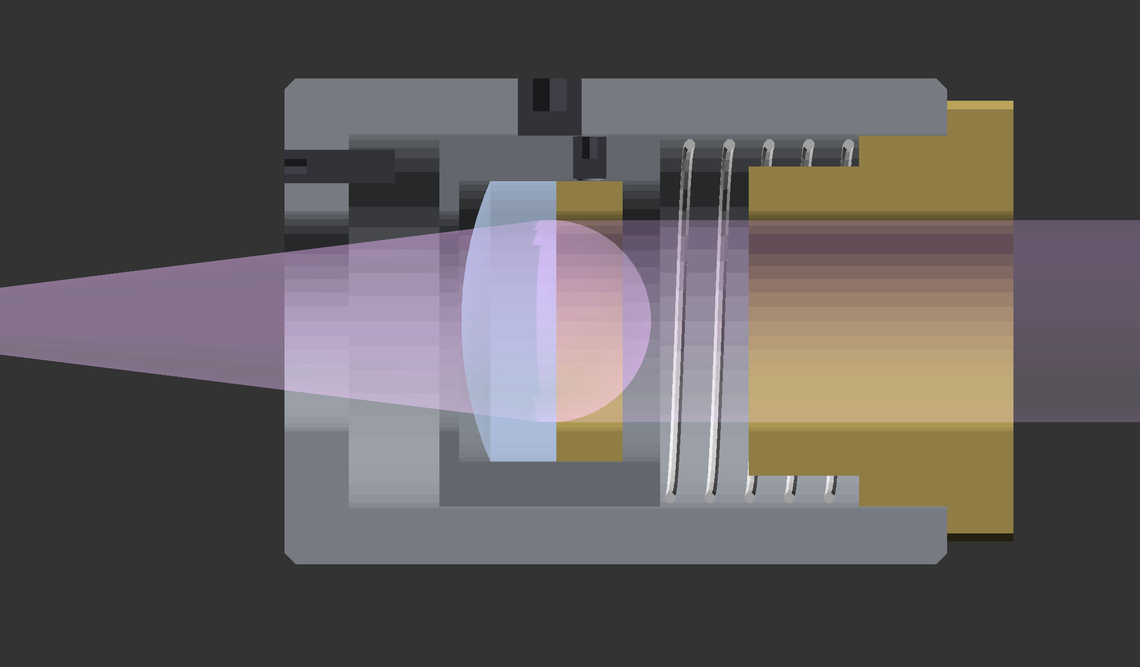 Cross-section of the lens staging mechanism showing spring, lens cell, and push screw